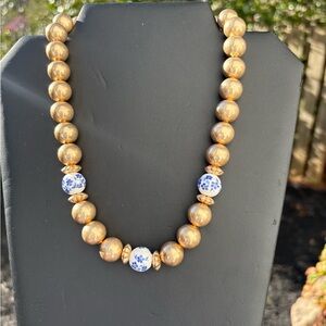 Gold Beaded Necklace with Blue Floral Porcelain Accents